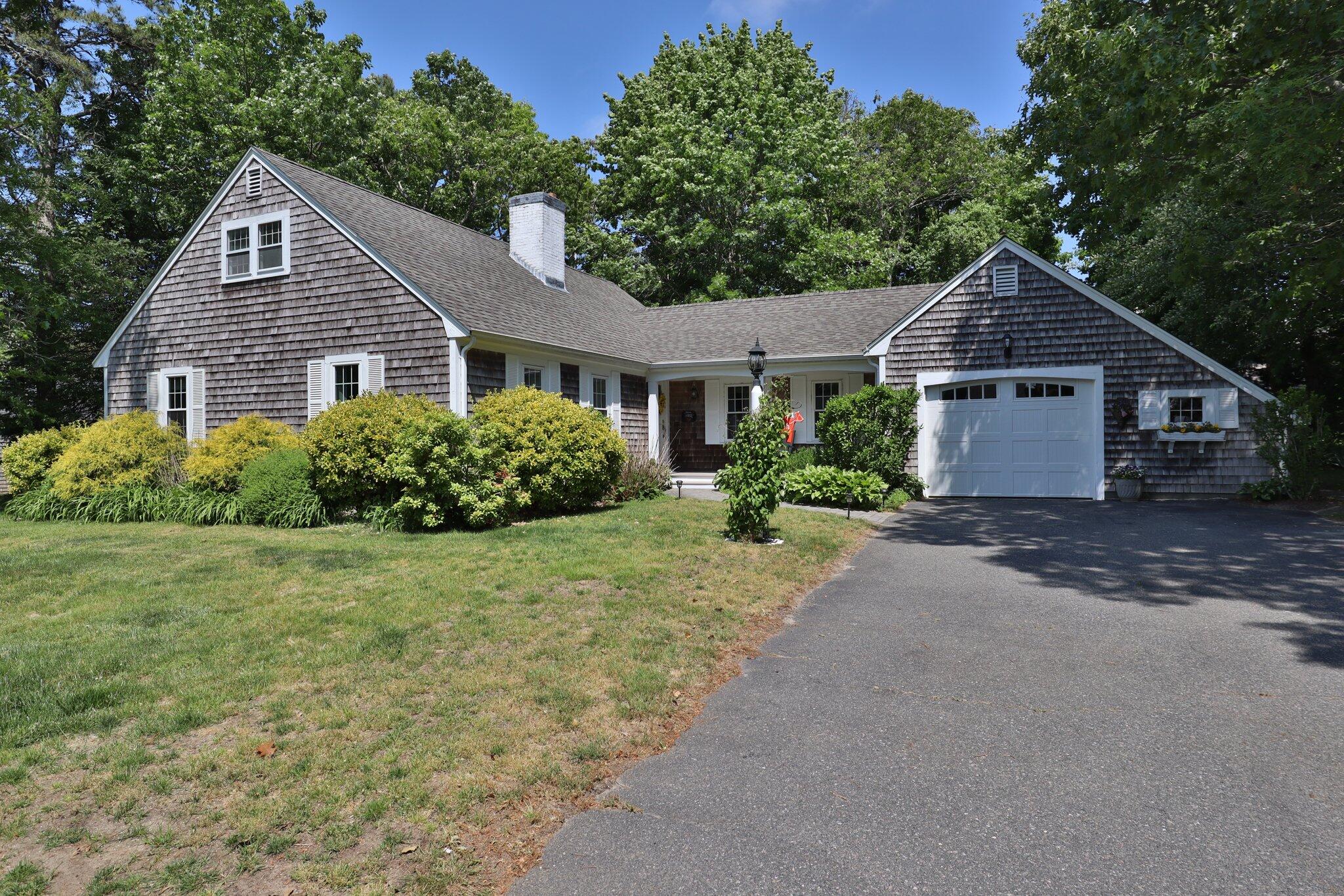 76 Pompano Road Yarmouth Port, MA 02675 - Photo 1 of 1 a house view with a garden space