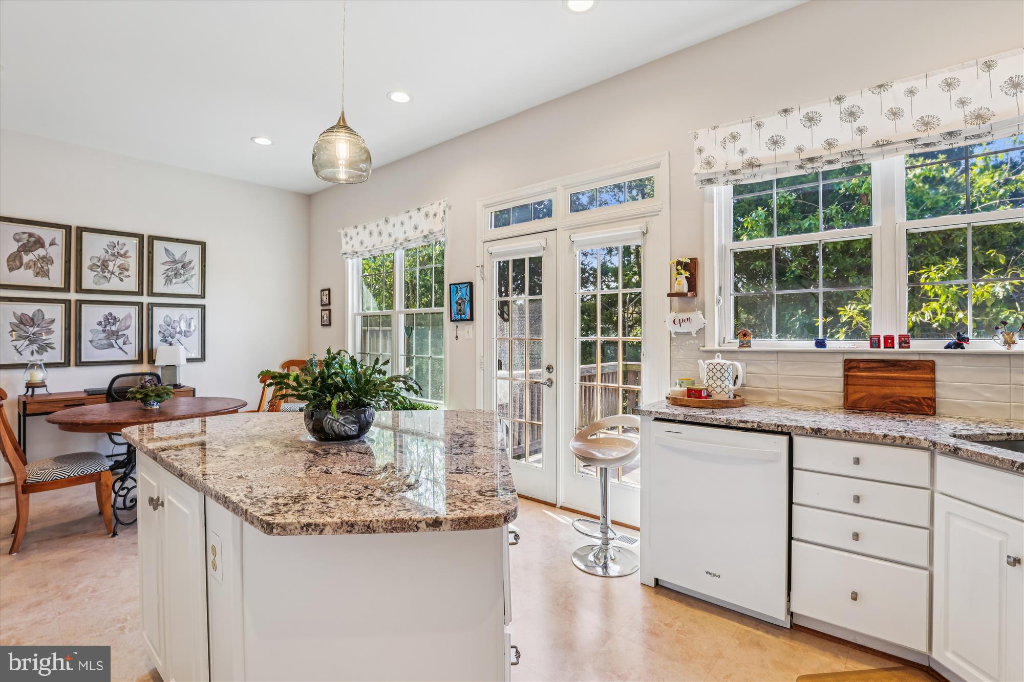 20679 Riptide Square Sterling, VA 20165 - Photo 14 of 43 a kitchen with granite countertop a sink and cabinets