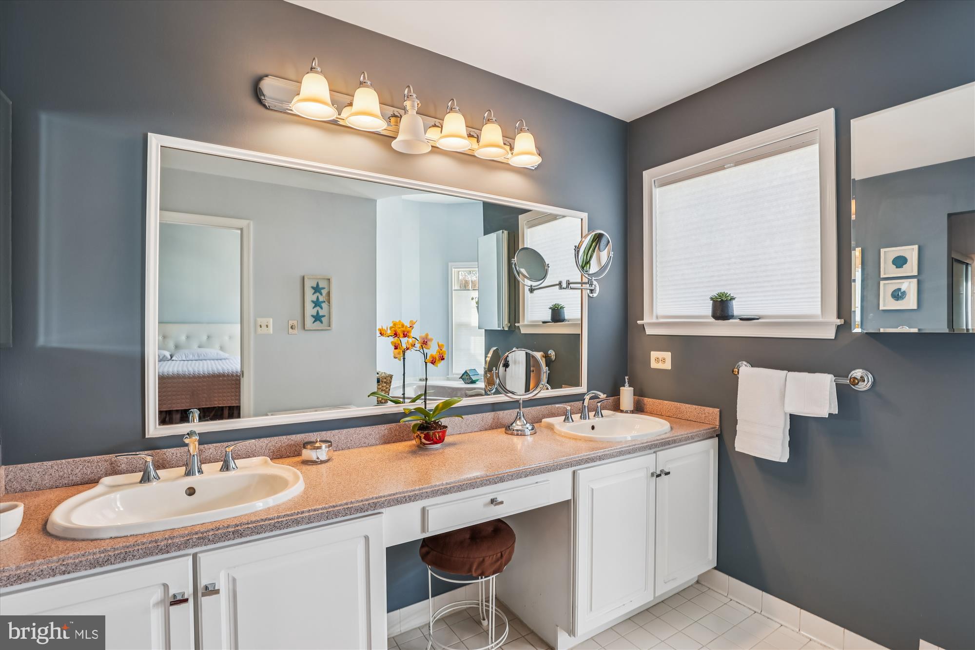 20679 Riptide Square Sterling, VA 20165 - Photo 23 of 43 a bathroom with a sink double vanity and a mirror