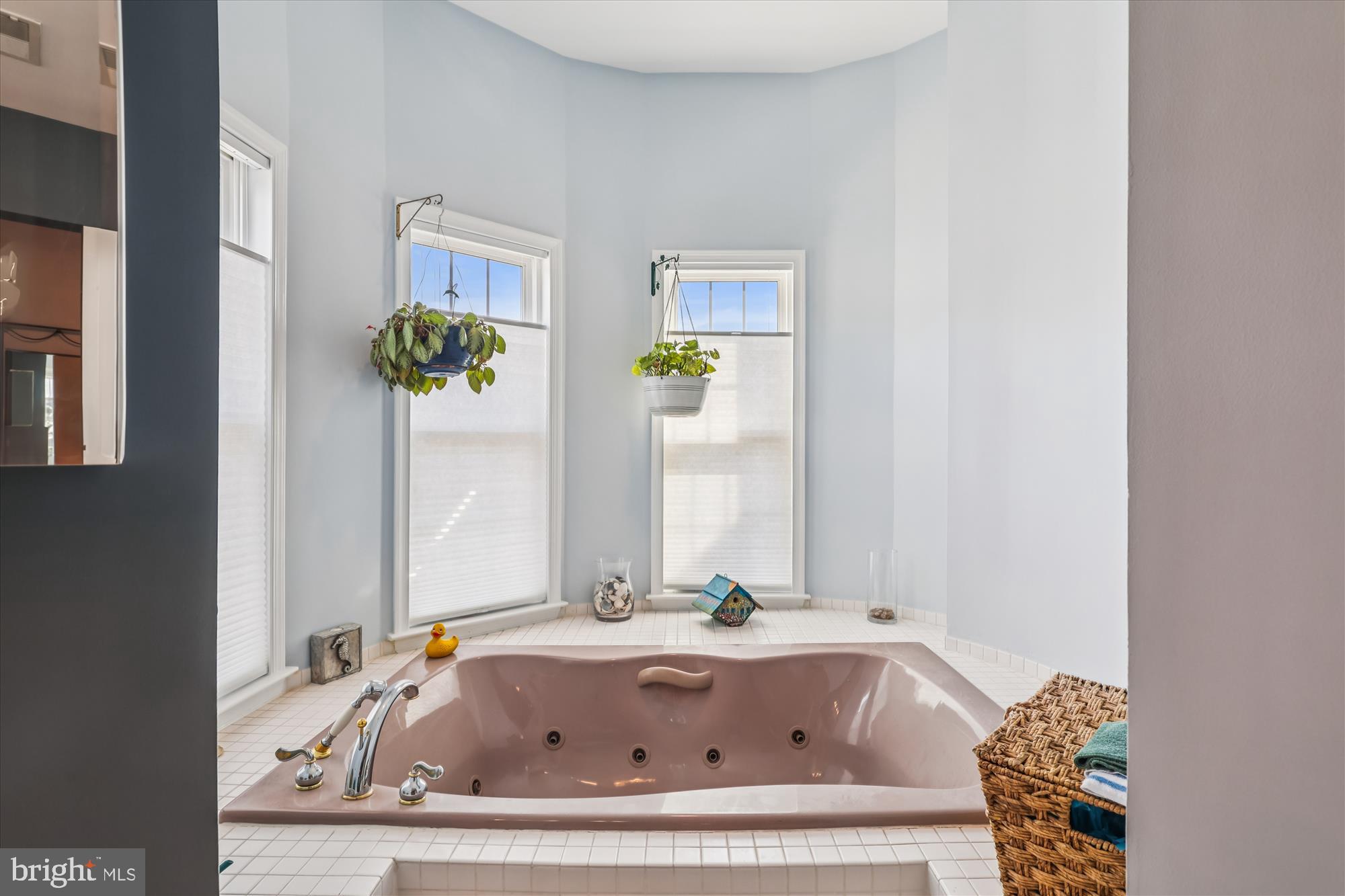 20679 Riptide Square Sterling, VA 20165 - Photo 24 of 43 a bathroom with bathtub and shower