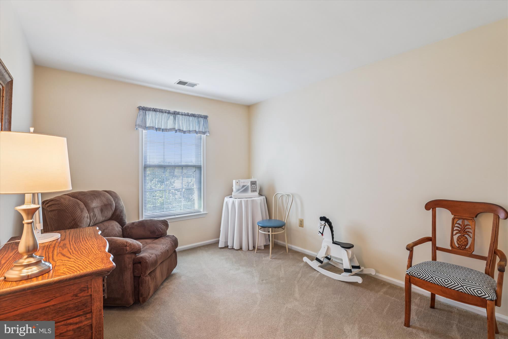 20679 Riptide Square Sterling, VA 20165 - Photo 30 of 43 a living room with furniture and a window