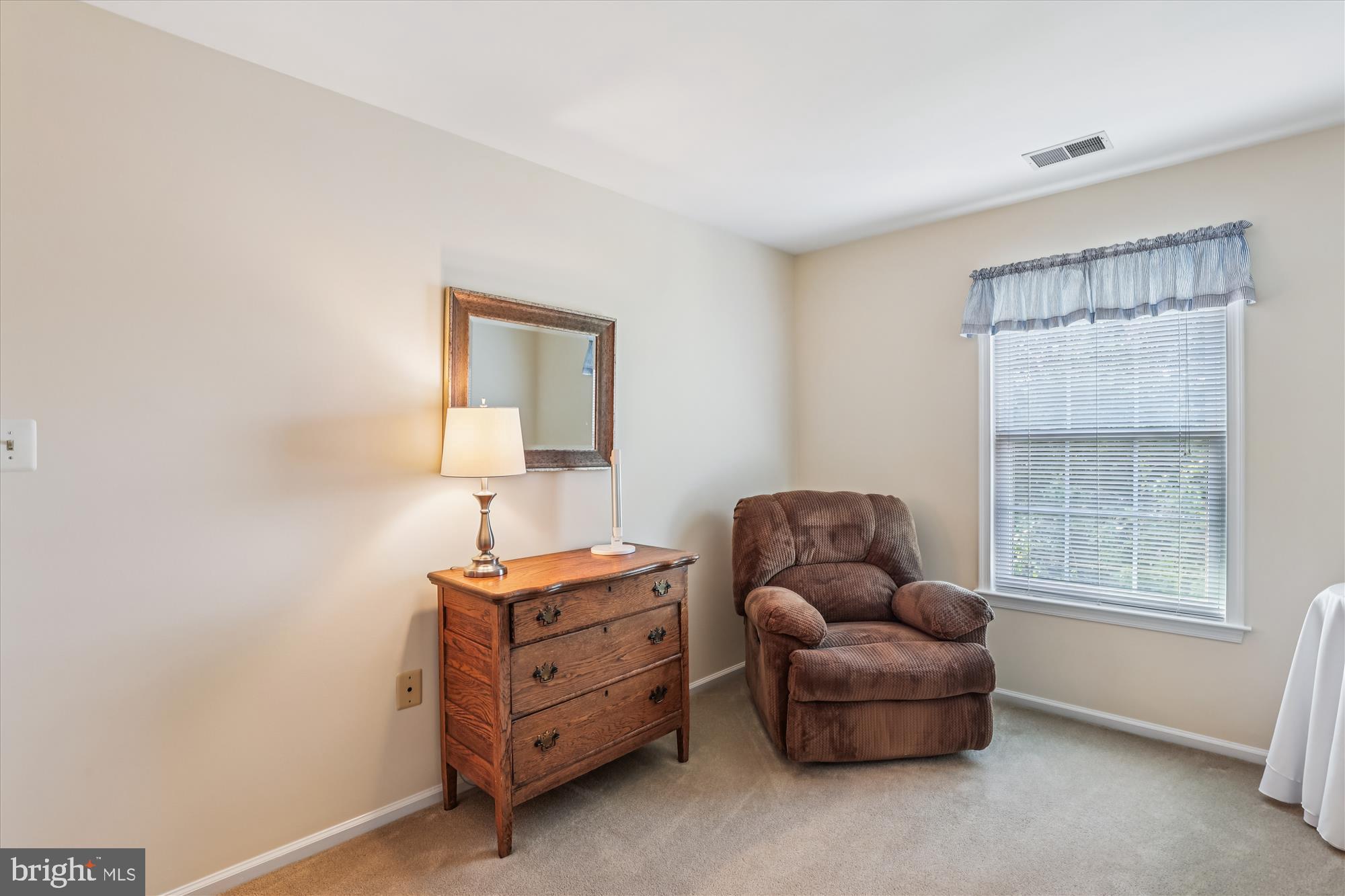 20679 Riptide Square Sterling, VA 20165 - Photo 31 of 43 a room with furniture and a window