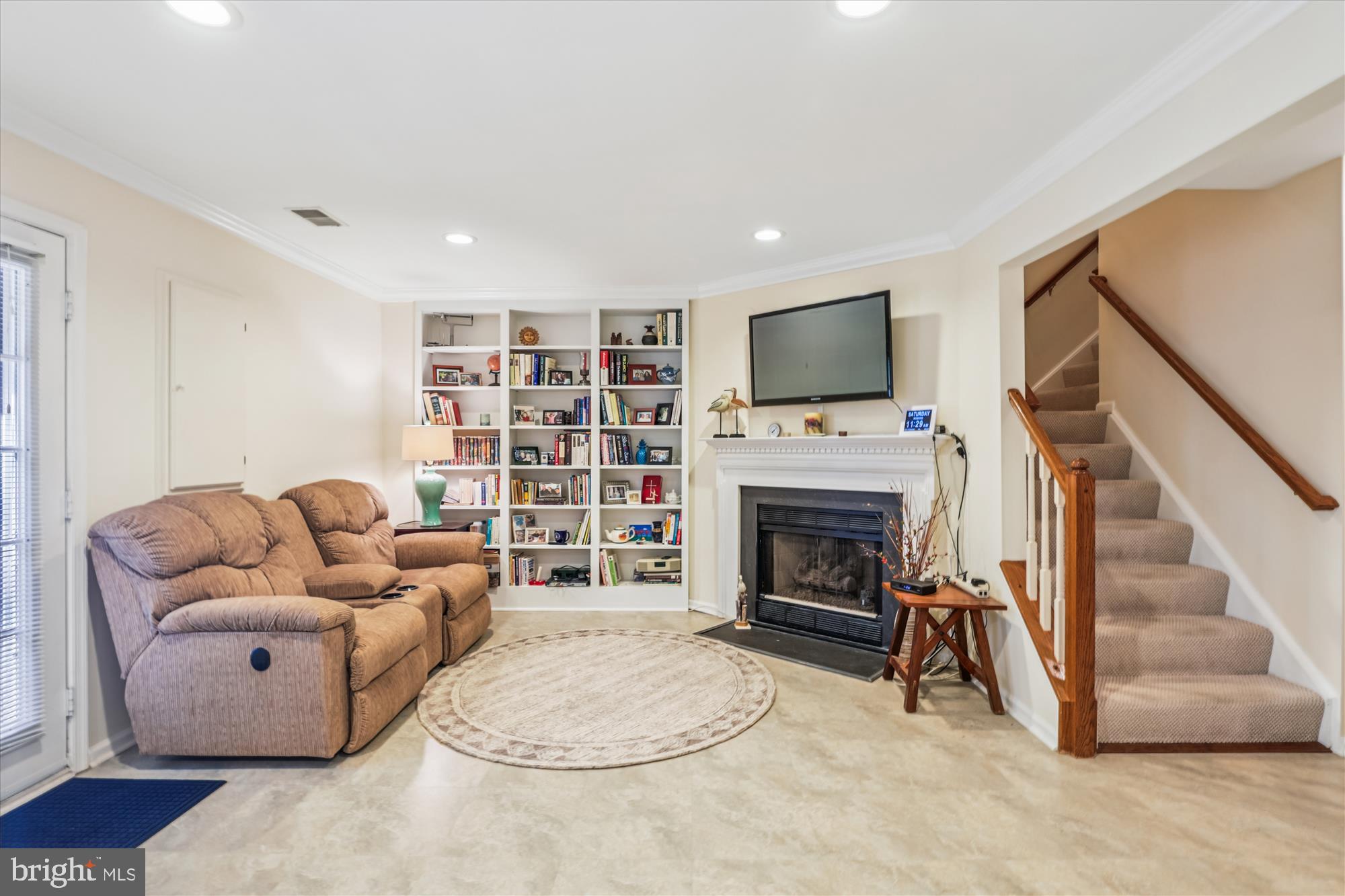 20679 Riptide Square Sterling, VA 20165 - Photo 35 of 43 a living room with furniture and a fireplace