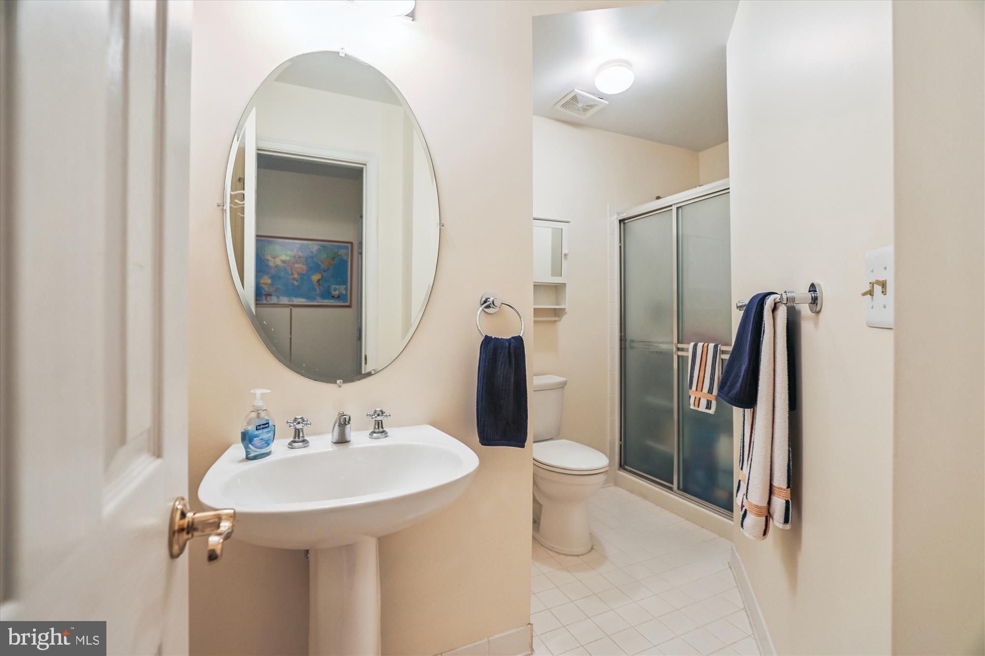 20679 Riptide Square Sterling, VA 20165 - Photo 39 of 43 a bathroom with a sink toilet and shower