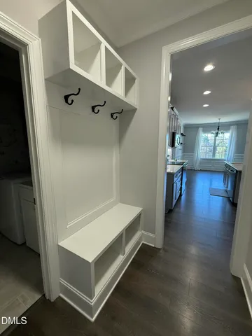 a hallway with wooden floor