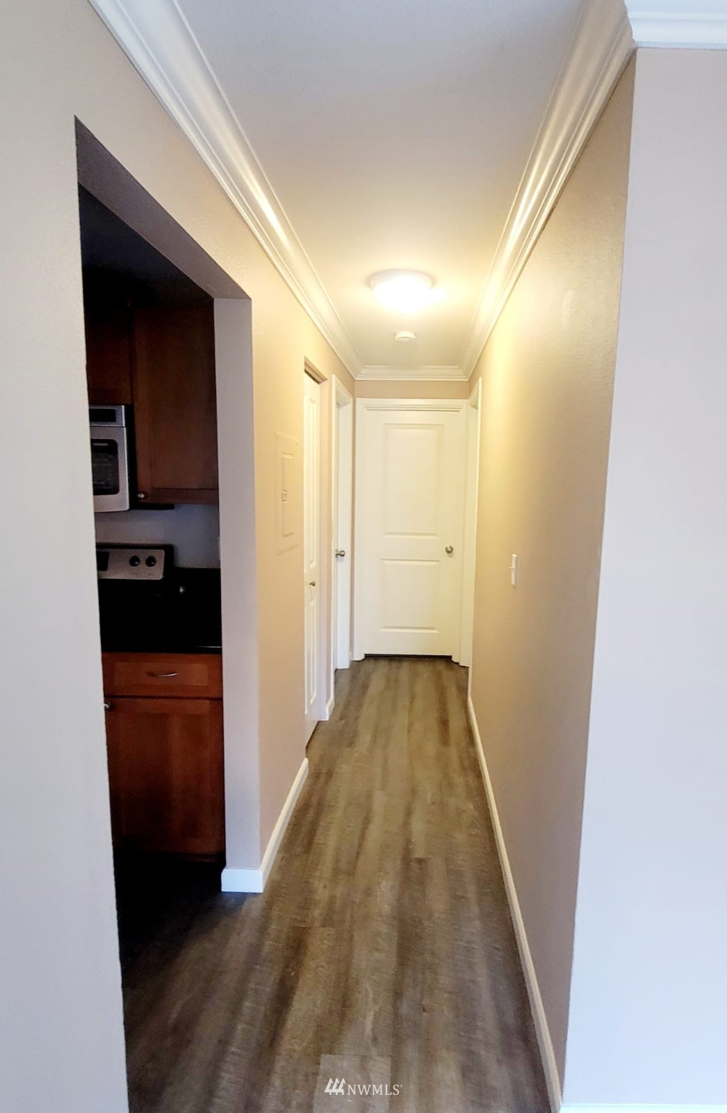 10813 Northeast 147th Lane, Unit N102 Bothell, WA 98011 - Photo 11 of 25 a view of a hallway
