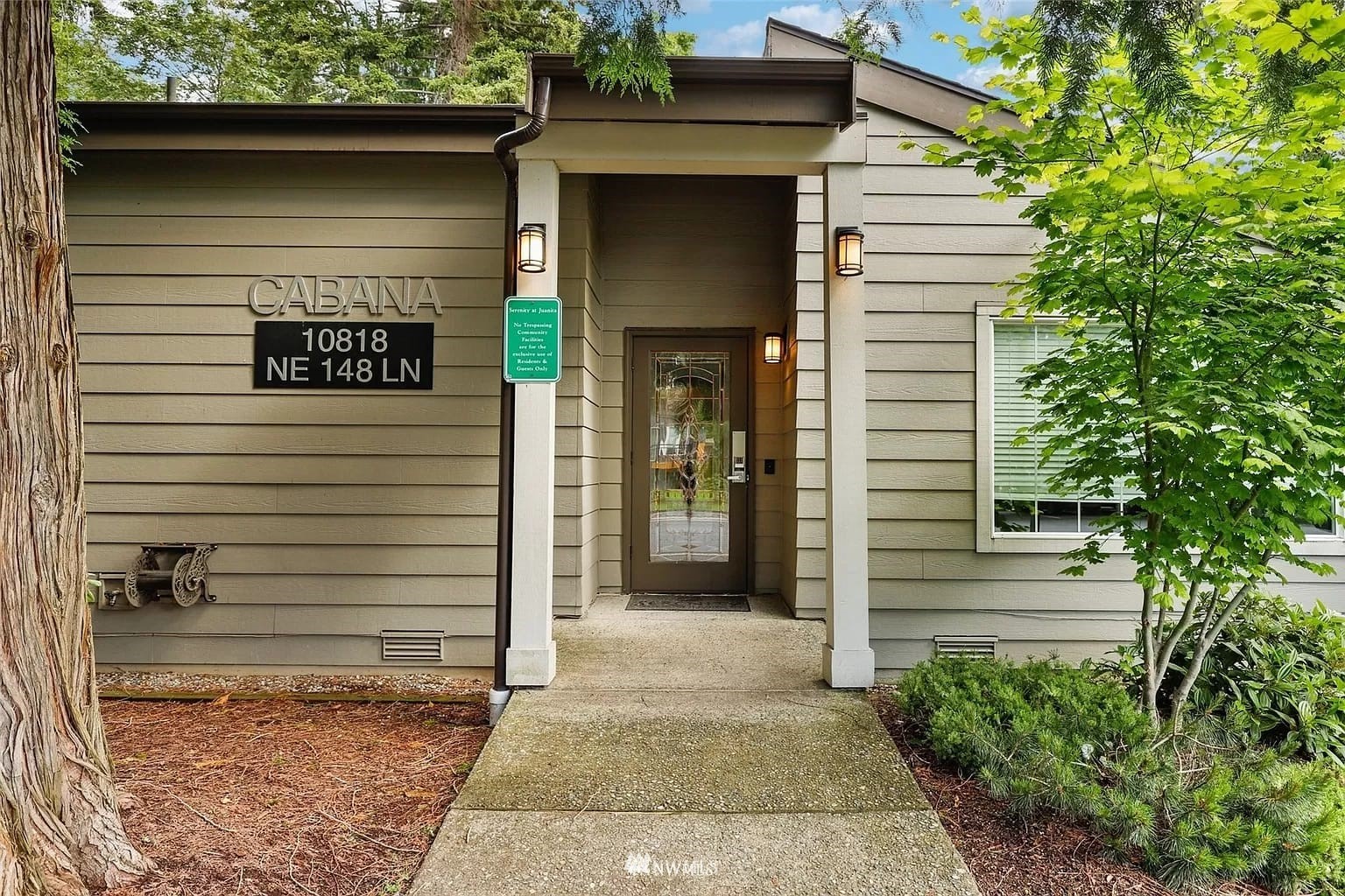 10813 Northeast 147th Lane, Unit N102 Bothell, WA 98011 - Photo 3 of 25 a view of a entryway door of the house