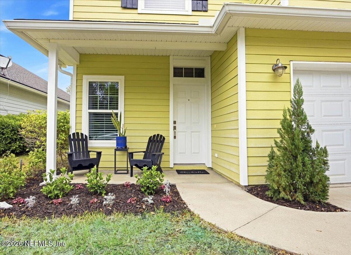 4009 Palm Way Jacksonville Beach, FL 32250 - Photo 2 of 24 a backyard of a house with outdoor seating