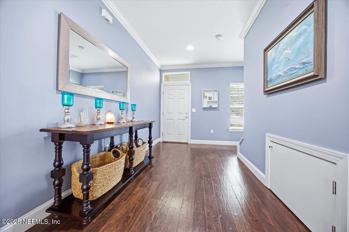 4009 Palm Way Jacksonville Beach, FL 32250 - Photo 3 of 24 a view of an entryway with wooden floor