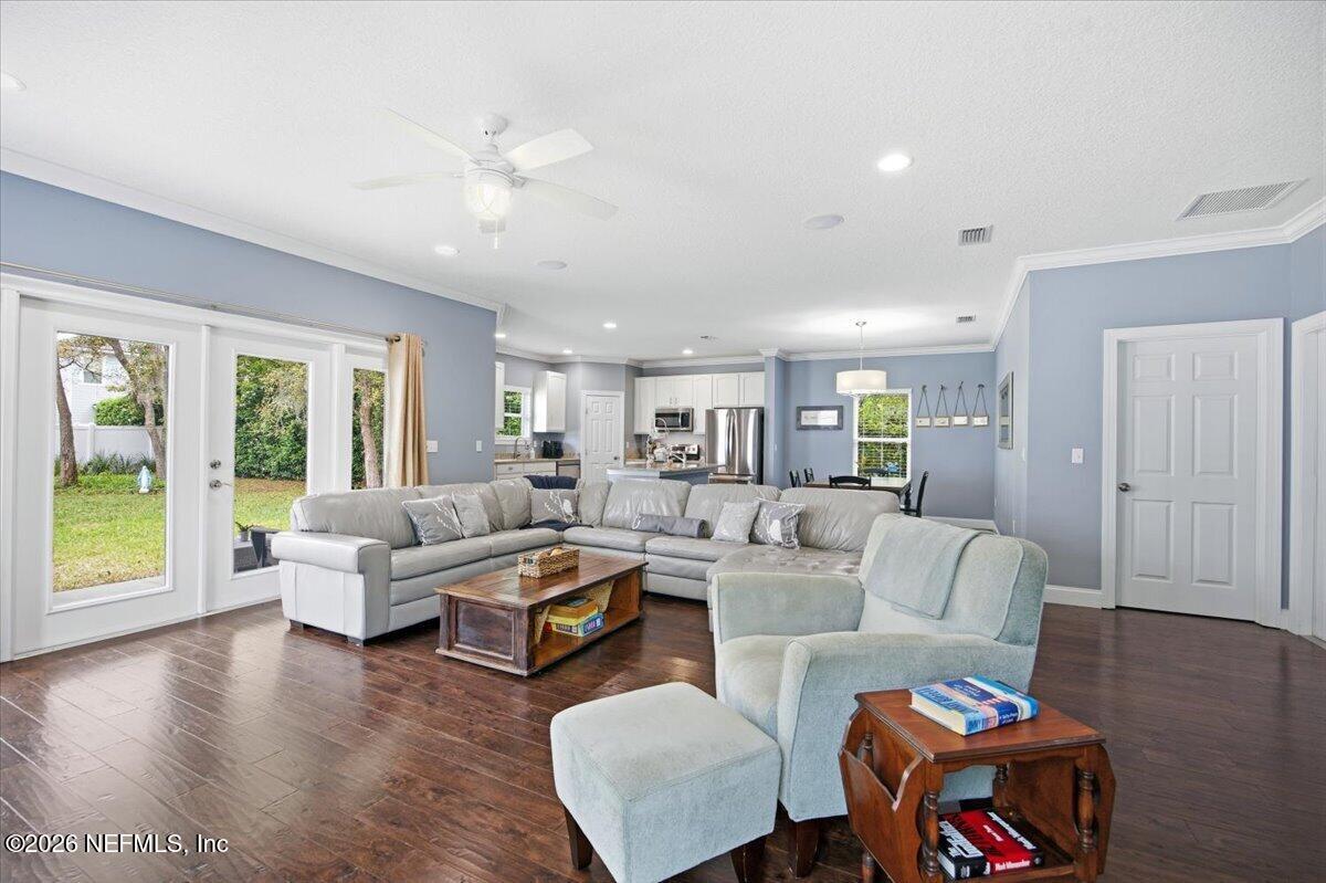 4009 Palm Way Jacksonville Beach, FL 32250 - Photo 4 of 24 a living room with furniture and a large window