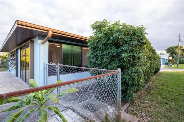 a view of balcony with yard