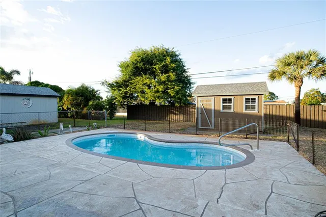 a view of outdoor space yard swimming pool and patio