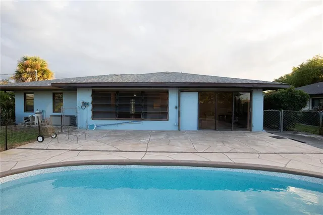 a front view of house with garage