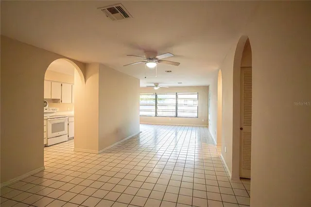 a view of an empty room and window