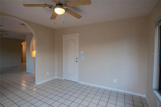 a view of an empty room and window