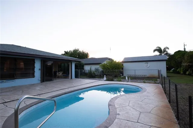 a view of house with yard outdoor seating and entertaining space