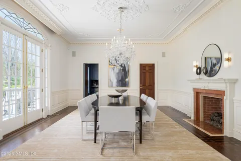 a kitchen with stainless steel appliances granite countertop a refrigerator and cabinets
