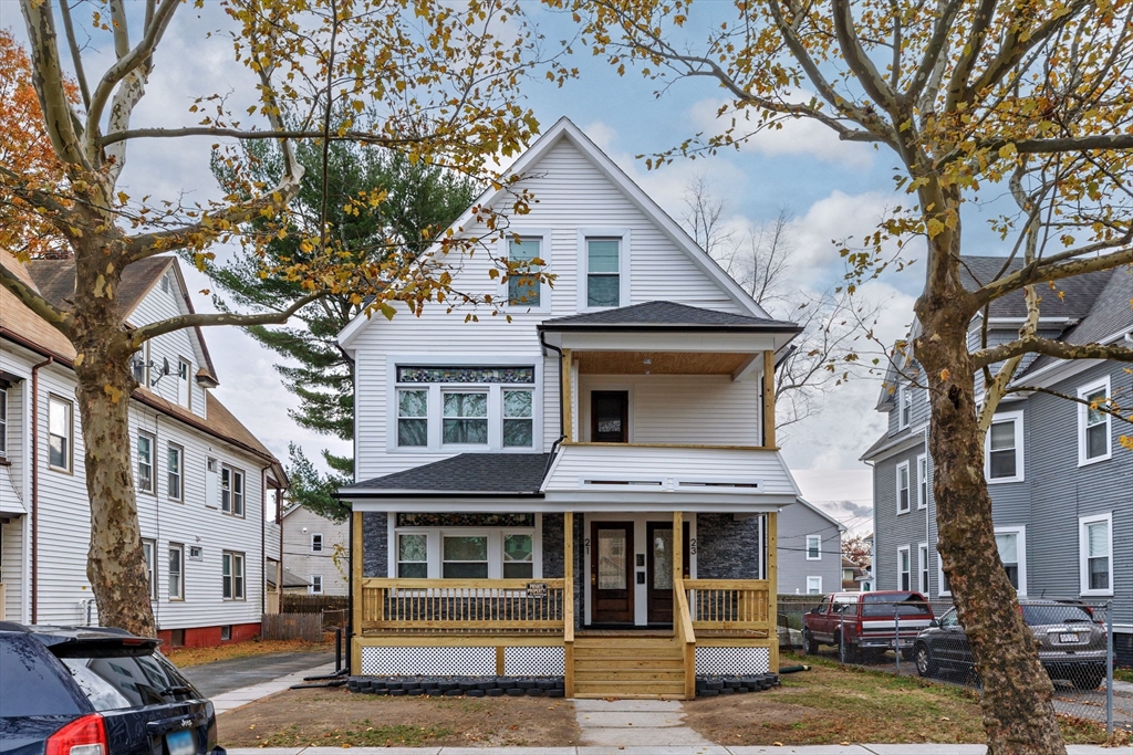21 Biltmore Street, Unit 1 Springfield, MA 01108 - Photo 1 of 17 a front view of a building with a tree