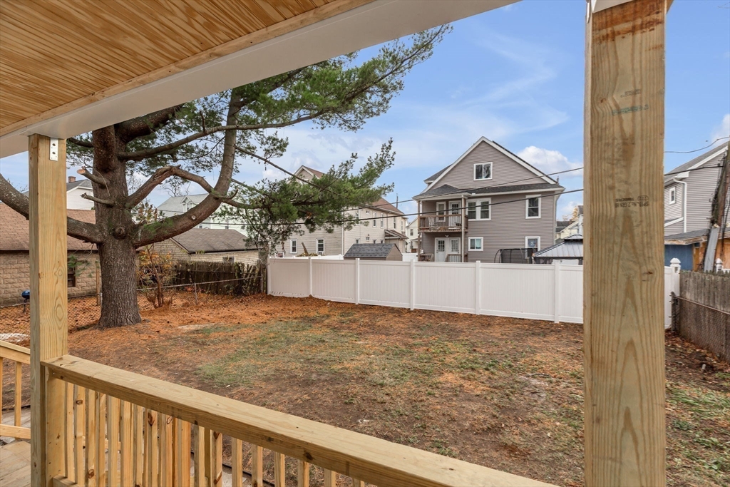 21 Biltmore Street, Unit 1 Springfield, MA 01108 - Photo 16 of 17 a view of a house with a yard