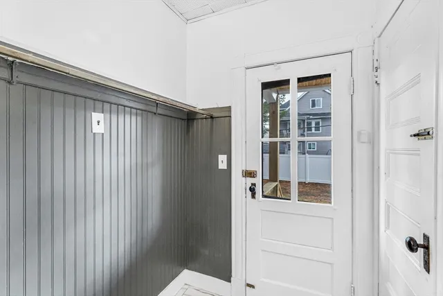 a view of wooden floor and closet