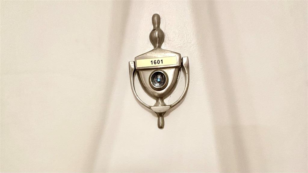 531 North Ocean Boulevard, Unit 1601 Pompano Beach, FL 33062 - Photo 16 of 32 a close up of a utility room with dryer and white walls