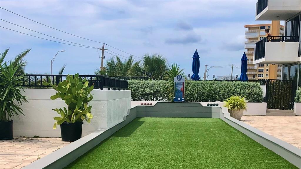 531 North Ocean Boulevard, Unit 1601 Pompano Beach, FL 33062 - Photo 22 of 32 a house view with a garden space