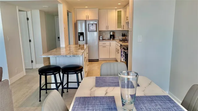a view of living room with furniture and rug