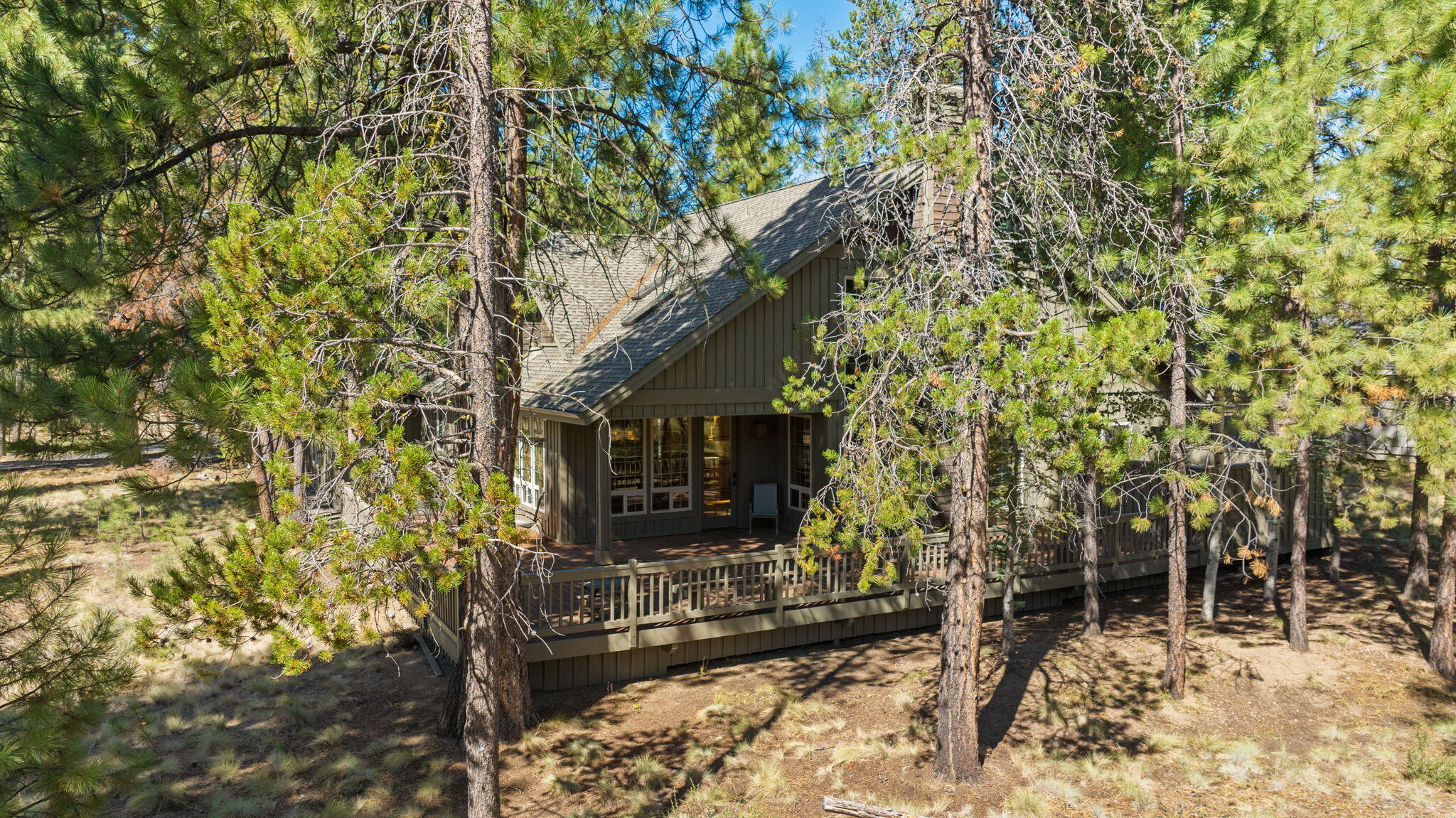 58026 Kinglet Road Sunriver, OR 97707 - Photo 35 of 39 a view of a house with a yard