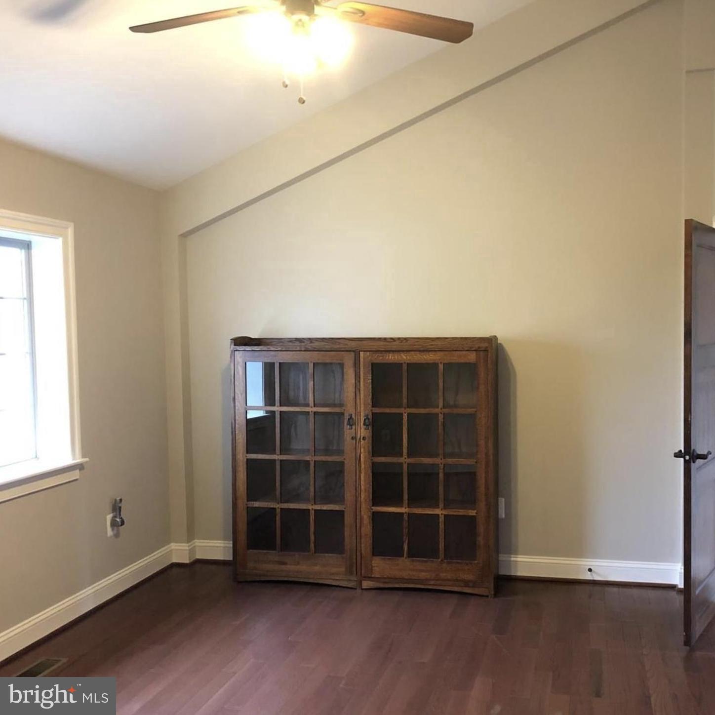 37793 Baker Mill Road, Unit 1 Purcellville, VA 20132 - Photo 11 of 14 an empty room with windows