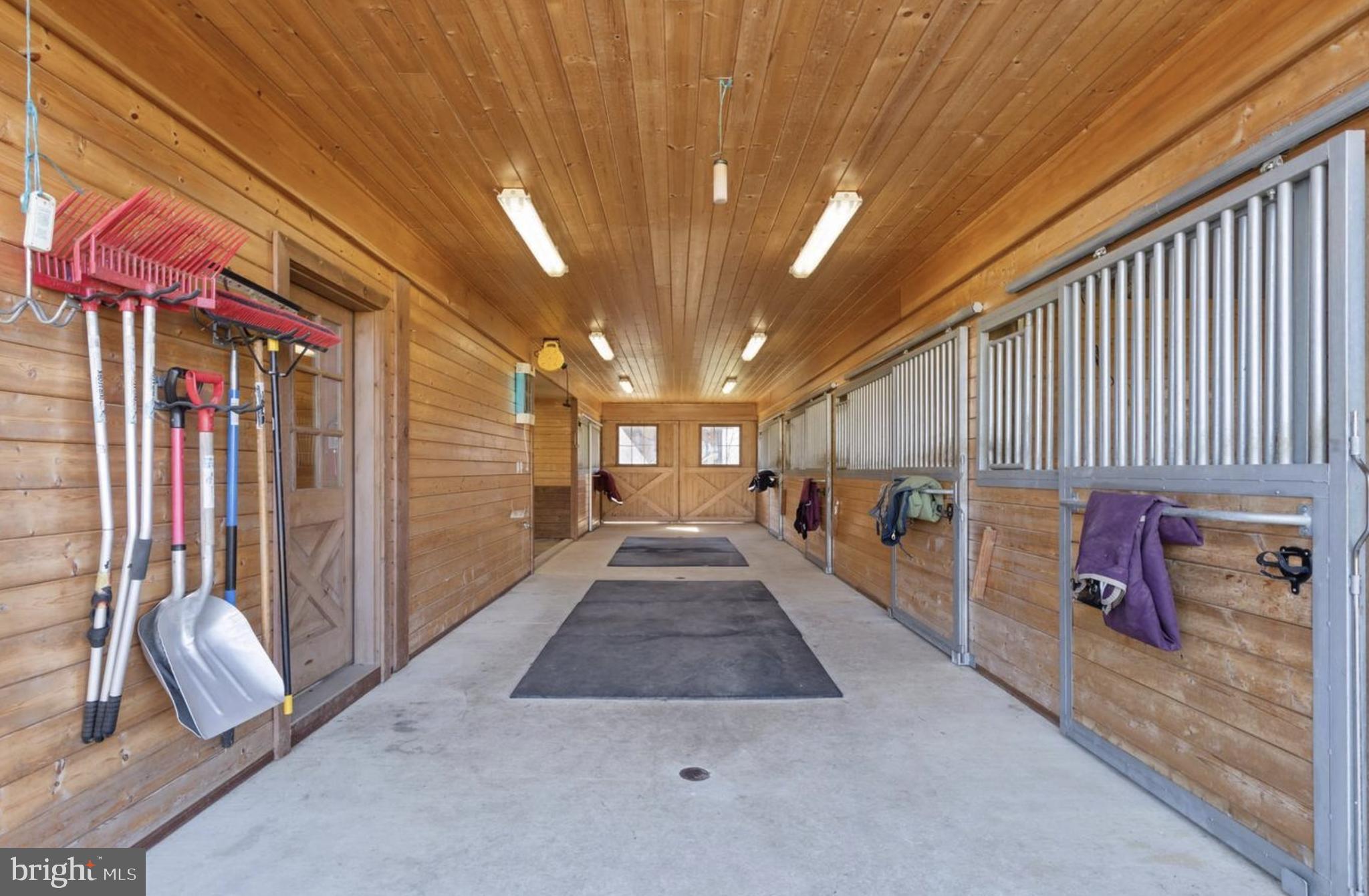 37793 Baker Mill Road, Unit 1 Purcellville, VA 20132 - Photo 13 of 14 a view of a porch with furniture