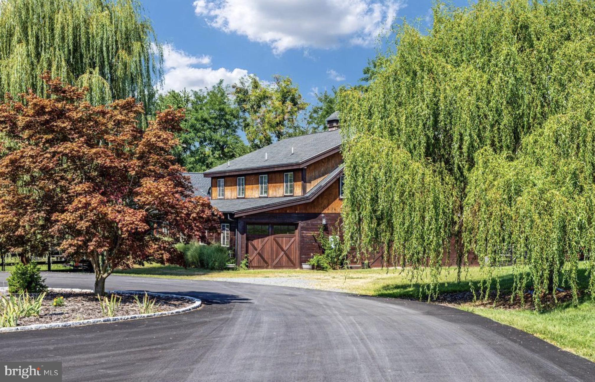 37793 Baker Mill Road, Unit 1 Purcellville, VA 20132 - Photo 3 of 14 a view of a house with a street