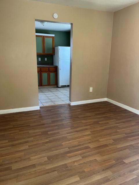 1614 Ryon Street, Unit A Houston, TX 77009 - Photo 11 of 12 a view of empty room with wooden floor