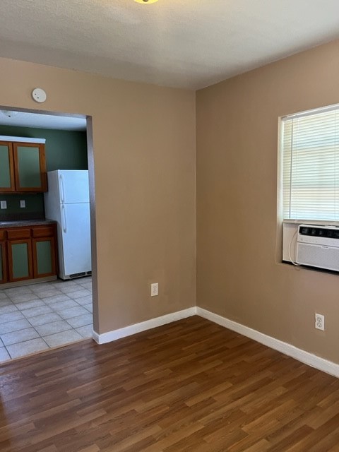 1614 Ryon Street, Unit A Houston, TX 77009 - Photo 10 of 12 a view of a livingroom with wooden floor and a window