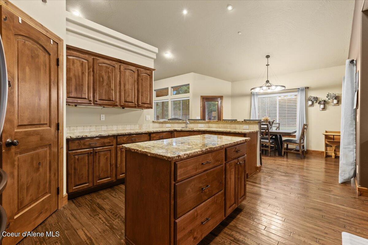 24665 Hunters Grove Court Rathdrum, ID 83858 - Photo 17 of 57 Kitchen Island