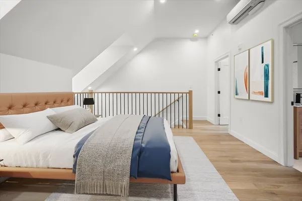 a bed room with a bed and a couch