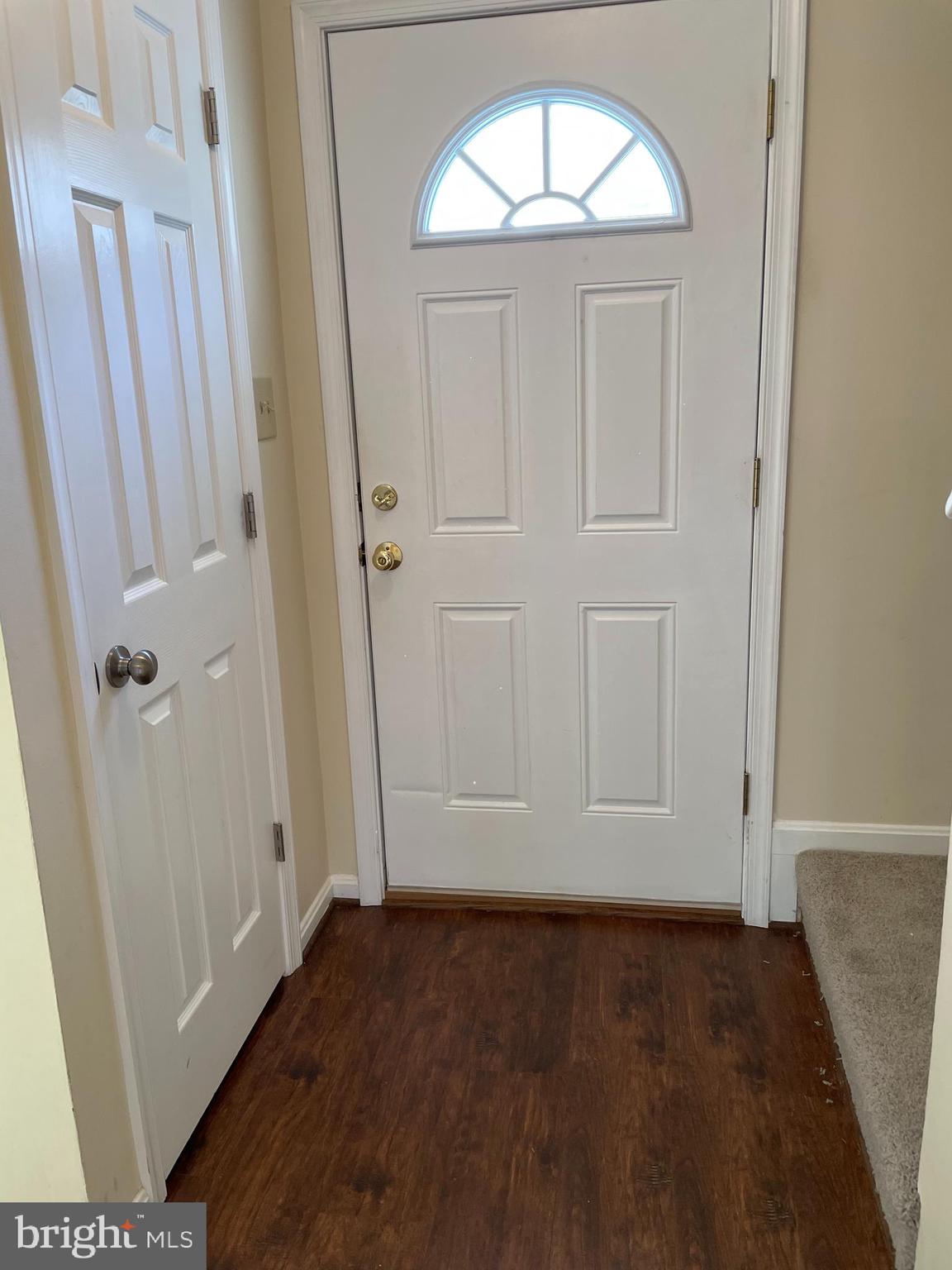 12405 Gooderham Way Gaithersburg, MD 20878 - Photo 3 of 31 an empty room with wooden floor and closet
