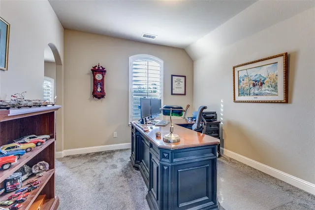 a room with furniture and a window