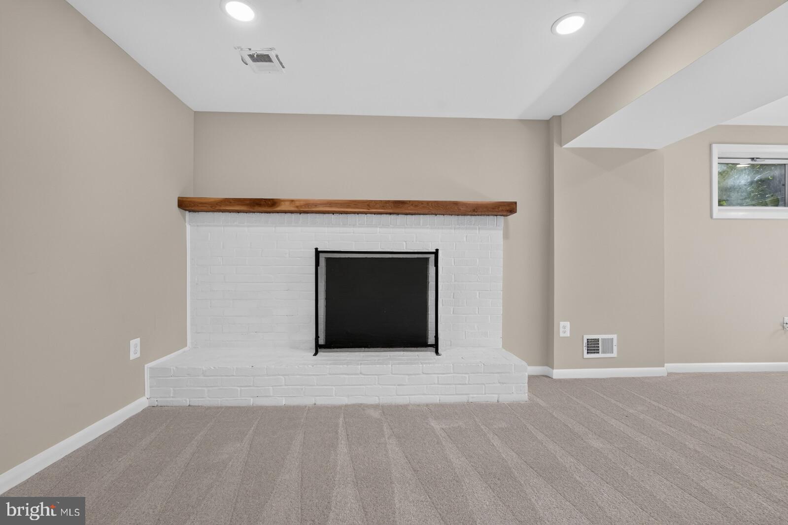 204 Rolling Road Gaithersburg, MD 20877 - Photo 26 of 53 Lovely family room fireplace!