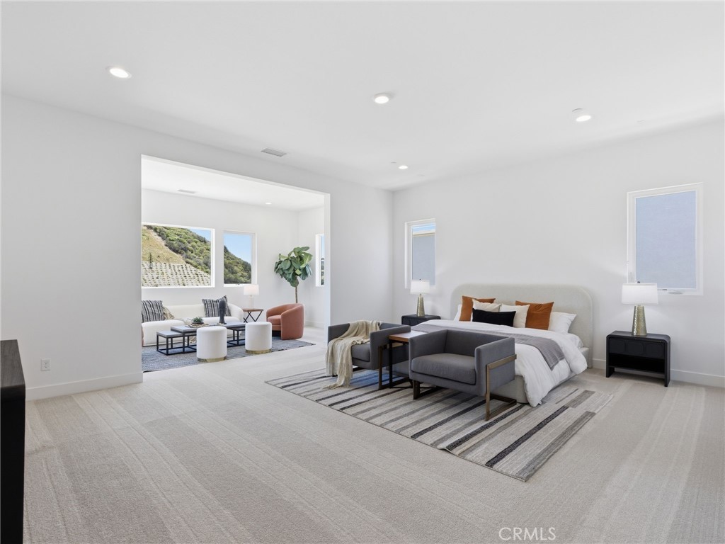 11850 Red Hawk Lane Porter Ranch, CA 91326 - Photo 28 of 51 Primary Bedroom & Retreat: Fernwood Italianate - The Ridge Collection at Bella Vista - Homesite 68