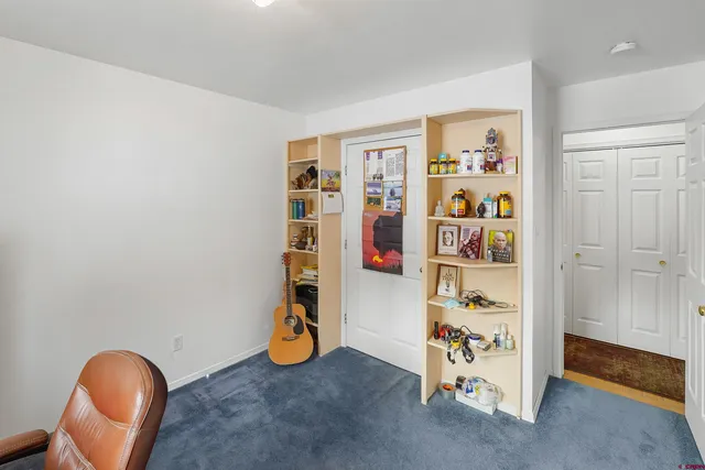 a view of a backyard with wooden floor
