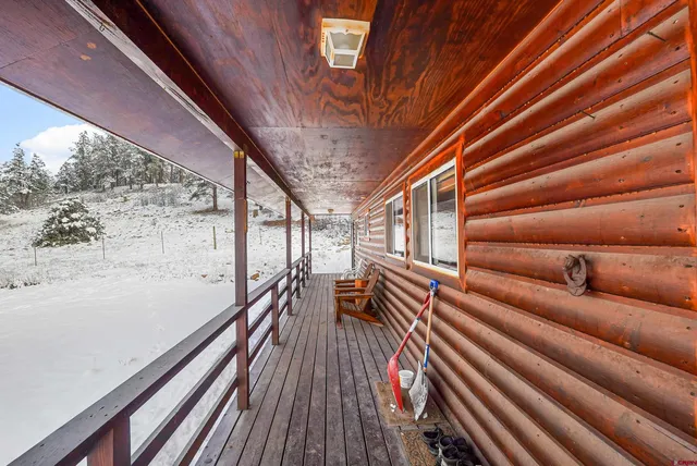 a view of sitting area with furniture and stove