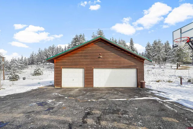 a house with trees in the background