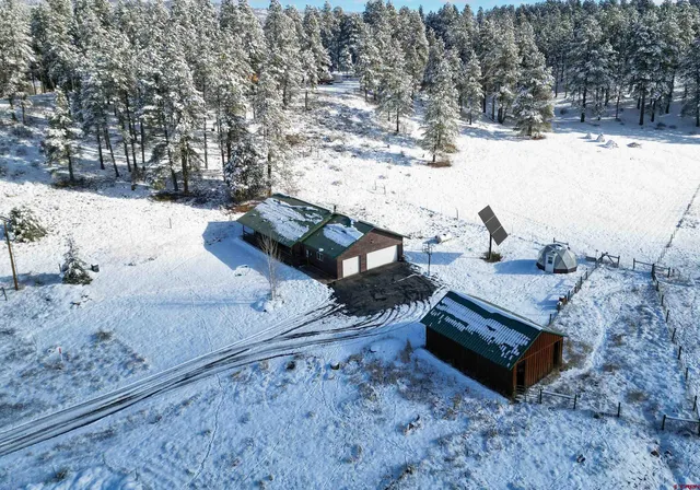 a view of a yard with a snow