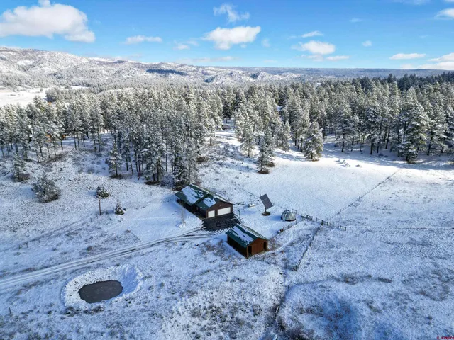 a view of a covered with snow in the background