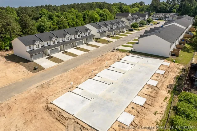 a view of a room with a large window