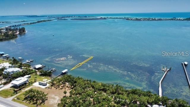 12350 Placida Road Placida, FL 33946 - Photo 15 of 17 a view of a lake with a mountain