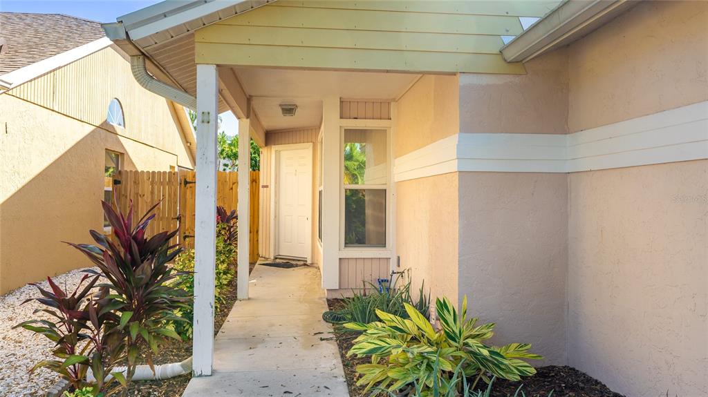 4537 South Lockwood Ridge Road Sarasota, FL 34231 - Photo 3 of 22 a house with a outdoor space