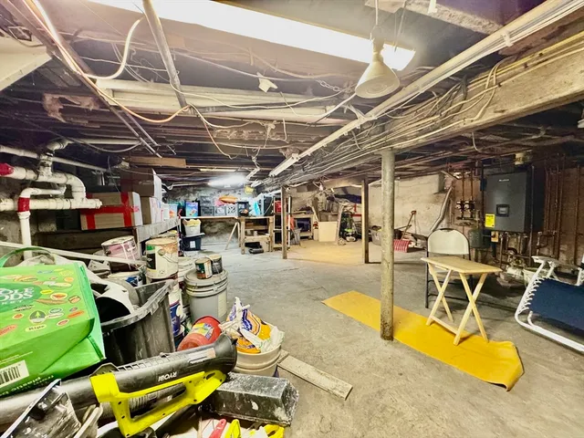 a view of a swimming pool with outdoor seating