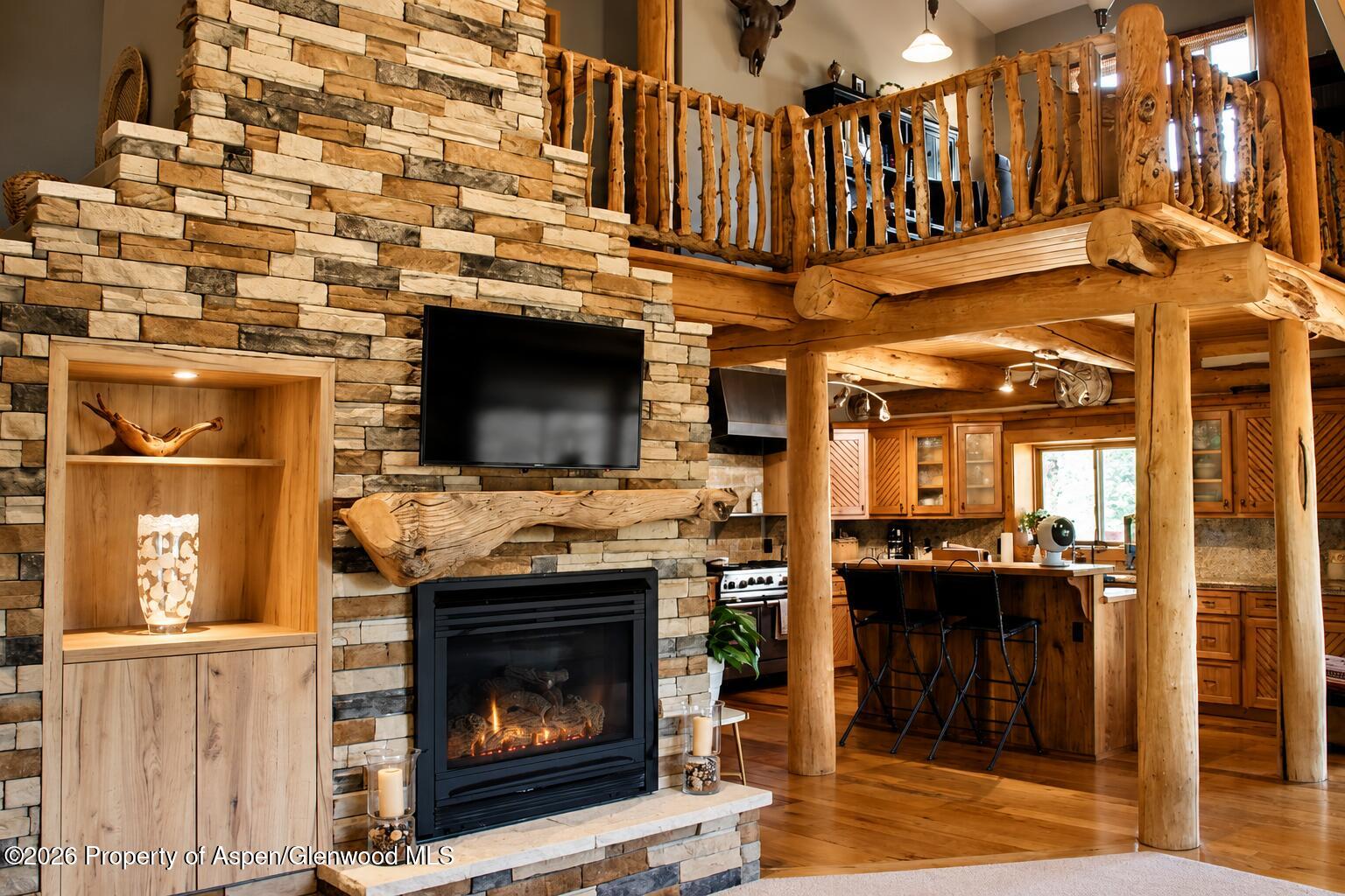 162 Original Road Basalt, CO 81621 - Photo 7 of 54 Living room with fireplace on