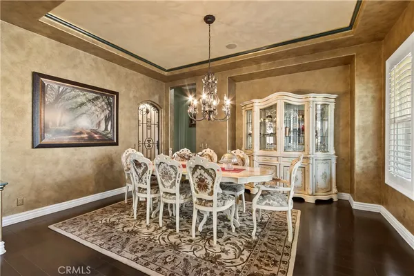a view of a door and a street sign on a wall